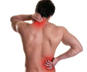 Man holding neck and lower back due to pain.